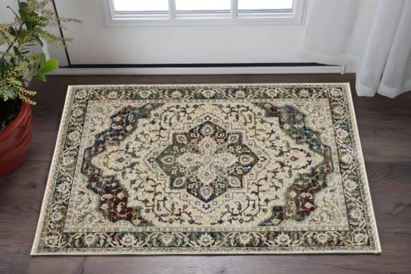 3' X 5' Beige Rust And Blue Medallion Area Rug With Fringe