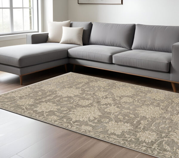 7' X 10' Gray And Beige Floral Area Rug With Fringe