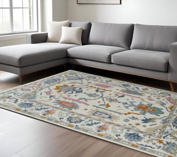 12' X 15' Ivory Blue And Pink Floral Hand Knotted Area Rug With Fringe