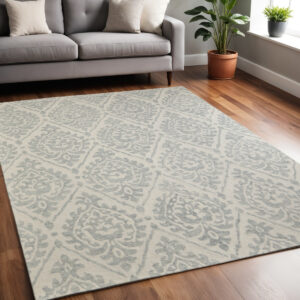 5' X 8' Ivory And Gray Floral Hand Tufted Area Rug