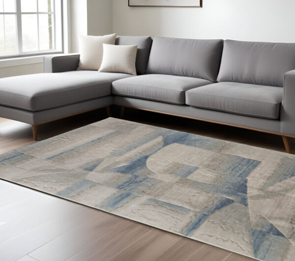 8' X 10' Blue Ivory And Gray Abstract Area Rug