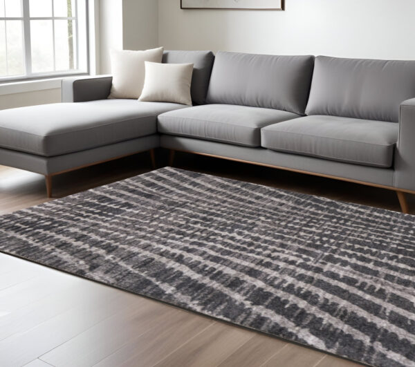 9' X 12' Black Gray And Ivory Abstract Area Rug